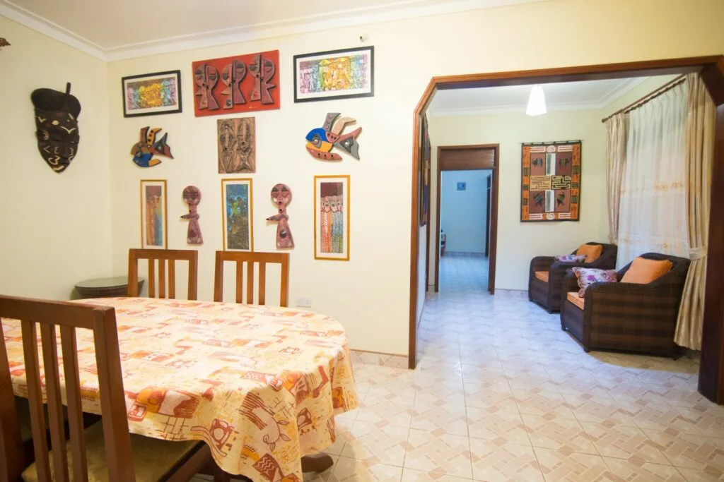 A relaxed indoor common area featuring local African artwork