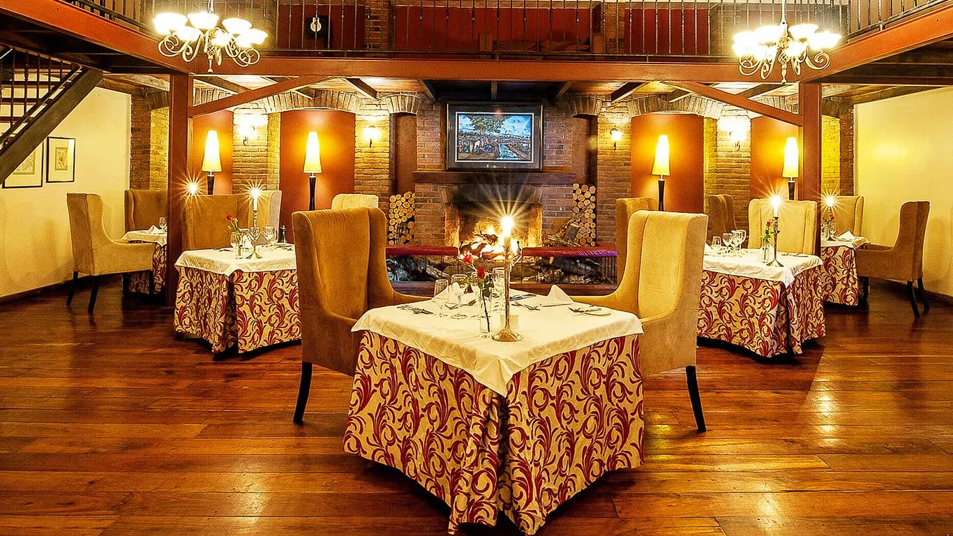 The Grill Room, the lodge's fine-dining restaurant warmed by an open fire.