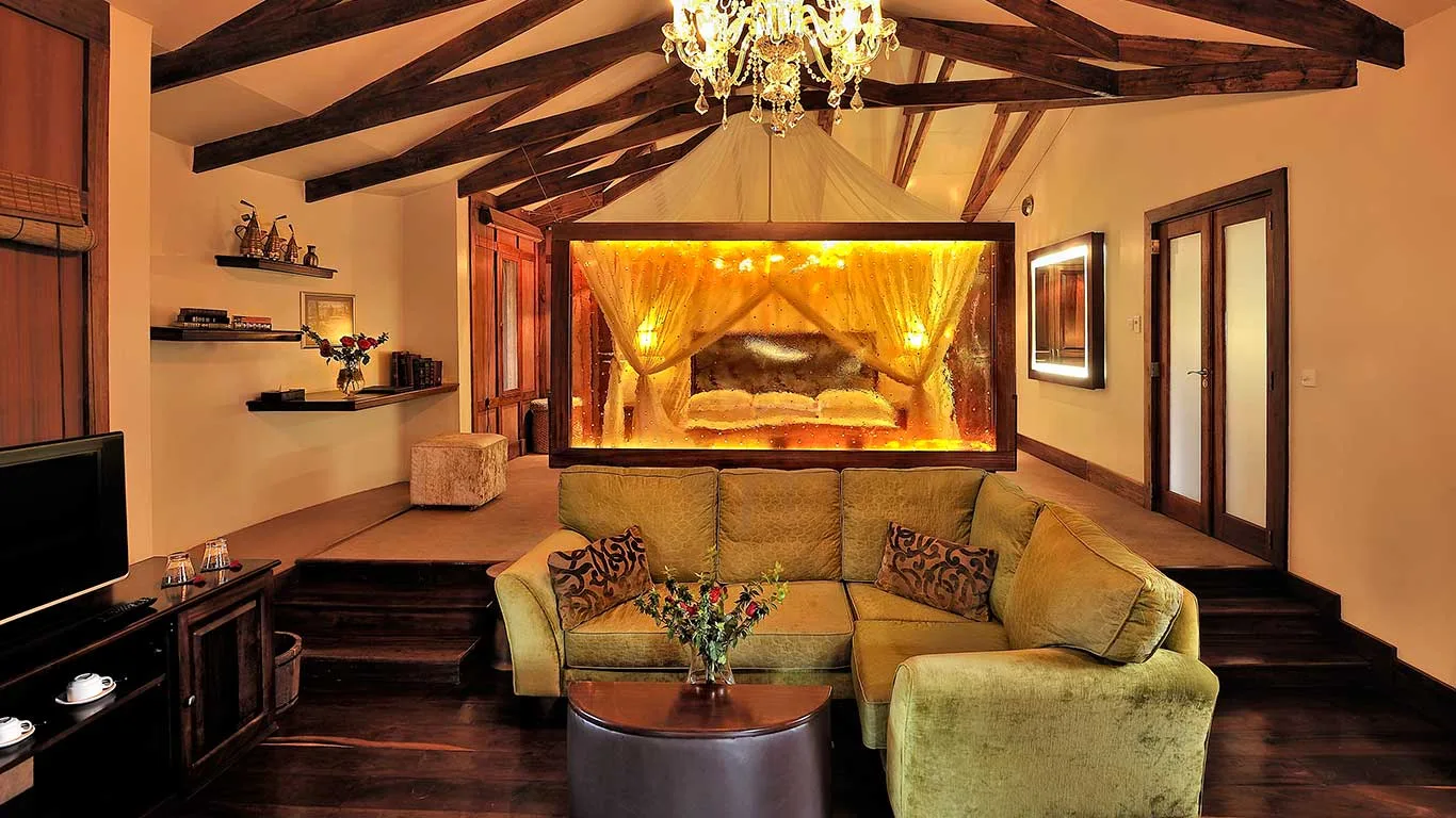 A Plantation Suite's cozy lounge, warmed by its own fireplace.