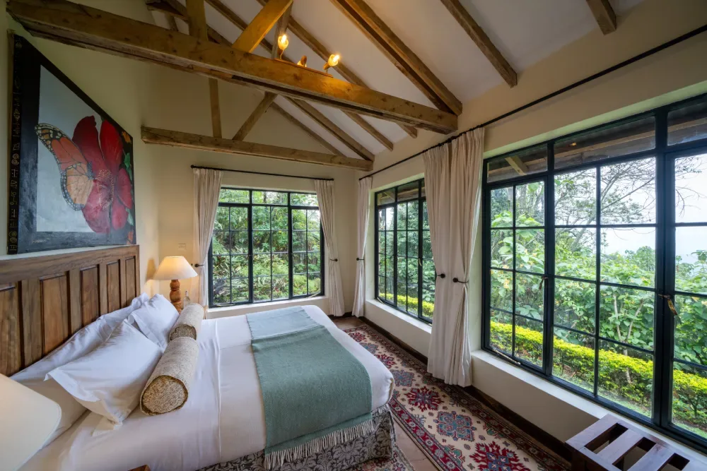 Forest-facing cottage bedroom