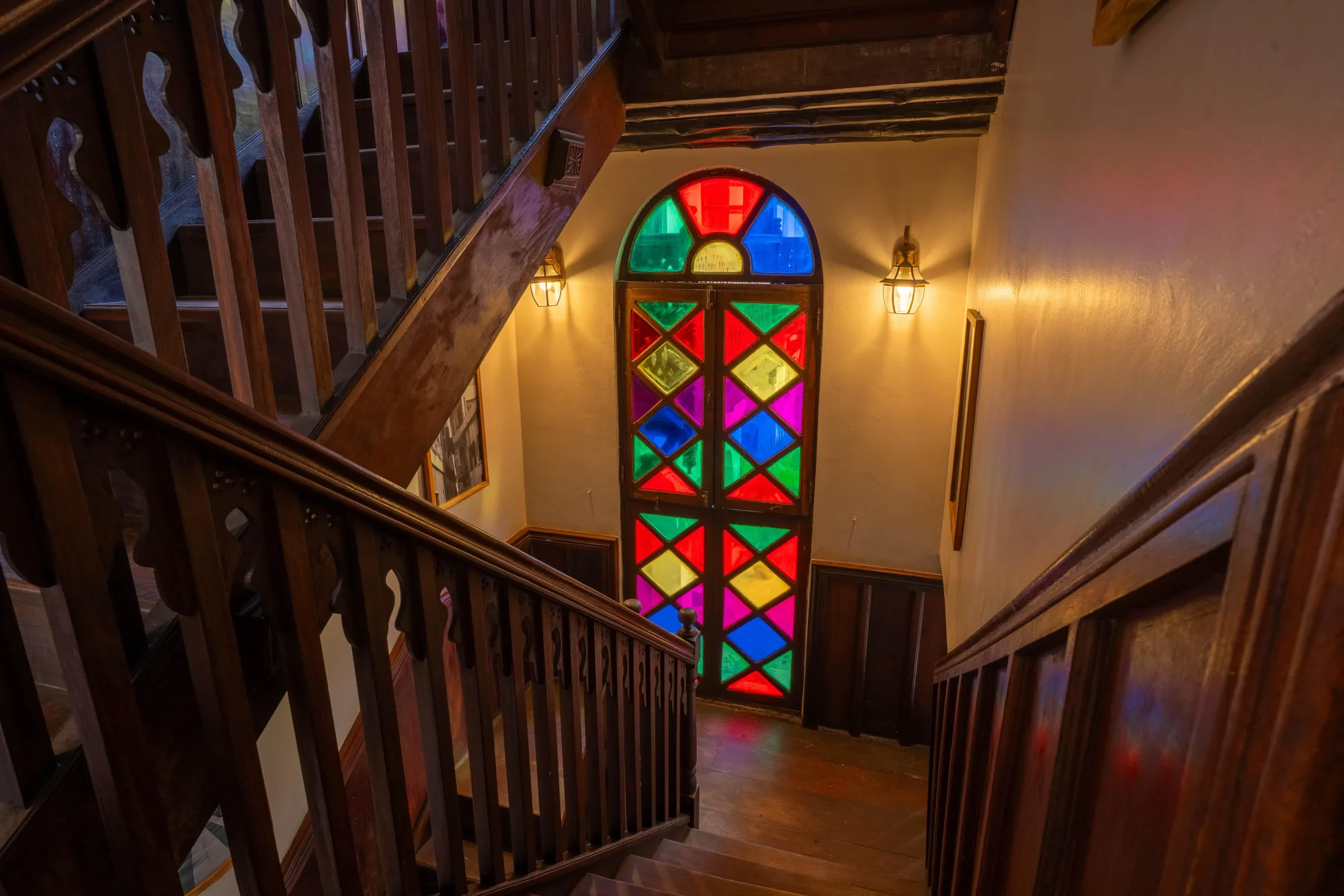 Historic staircase and stained glass