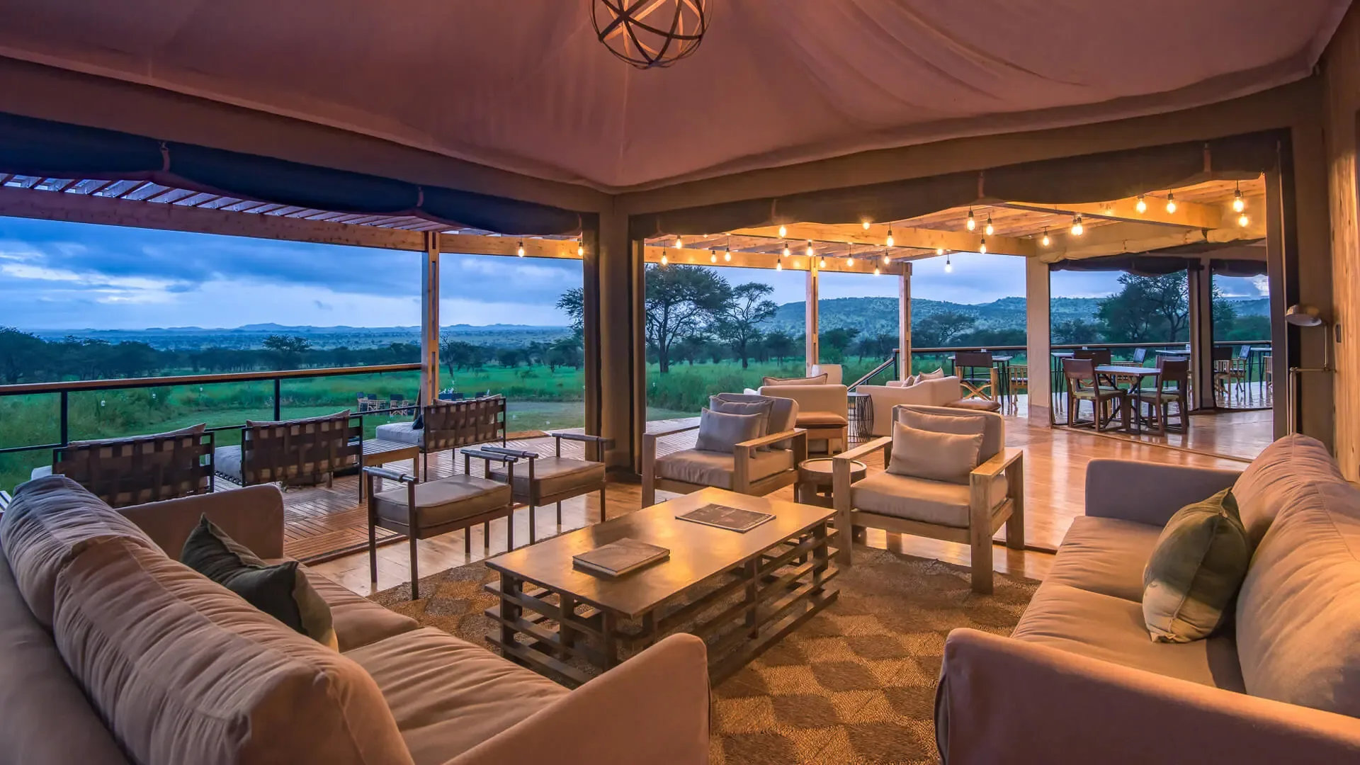The main area at sunset, Dunia's communal lounge and fire deck.