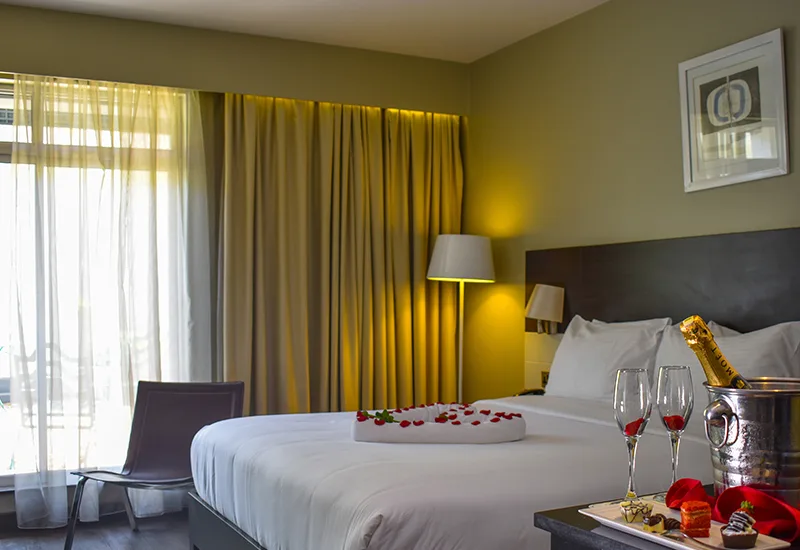 Superior rooms come dressed with crisp white linens and modern décor.