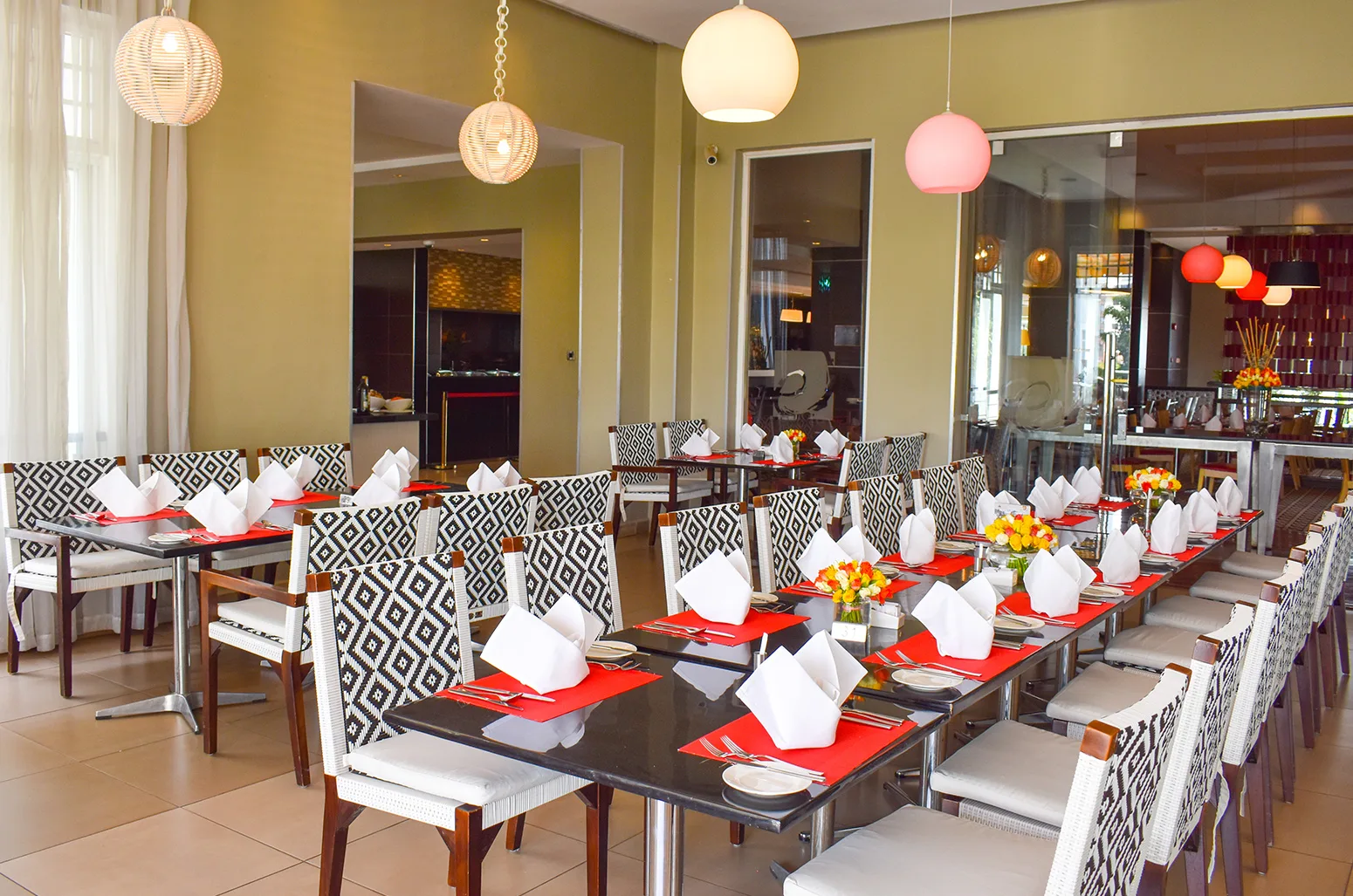 The Galaxy Restaurant serves all-day dining beneath its signature globe pendant lights.