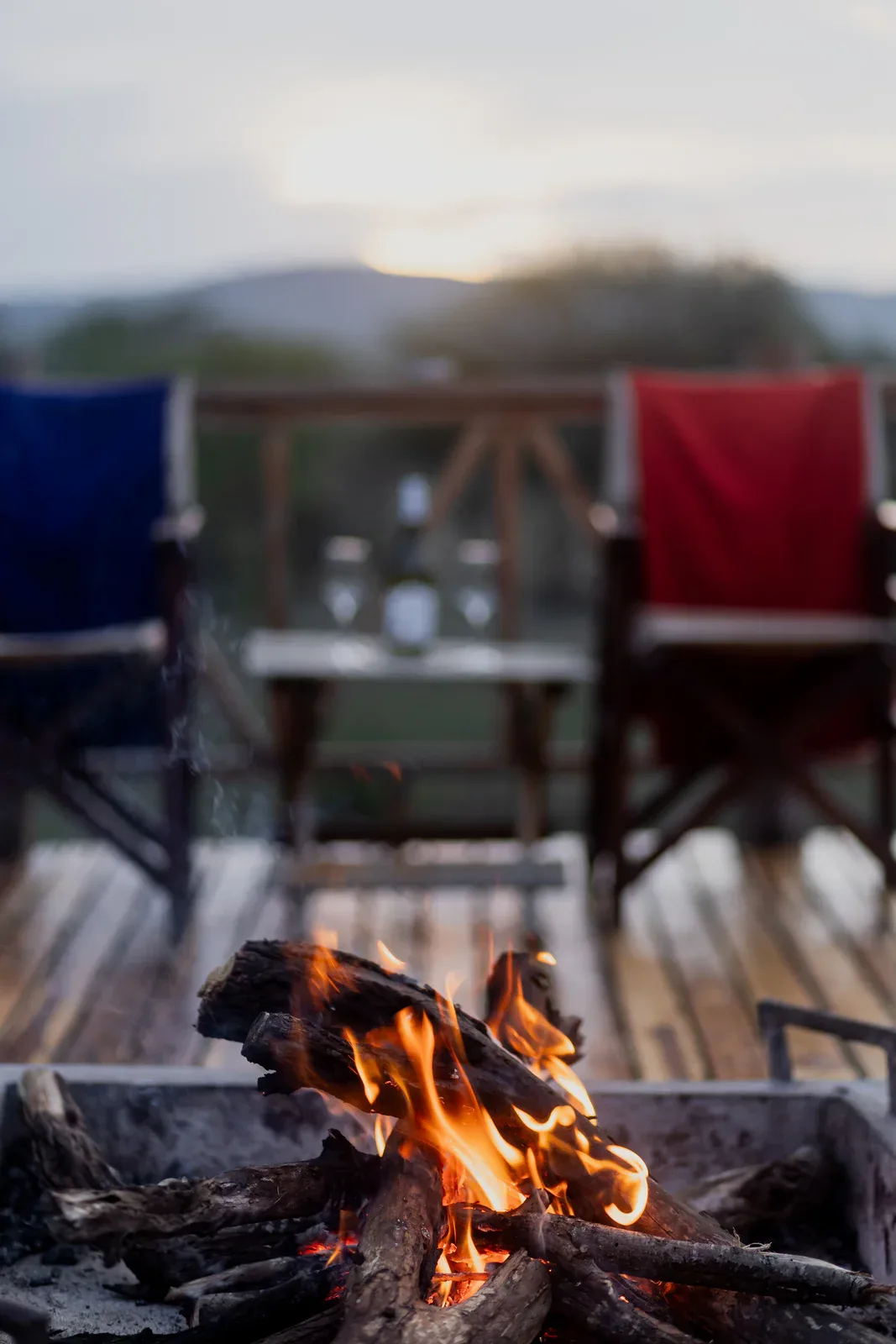 Evenings end around the campfire beneath the Serengeti sky.