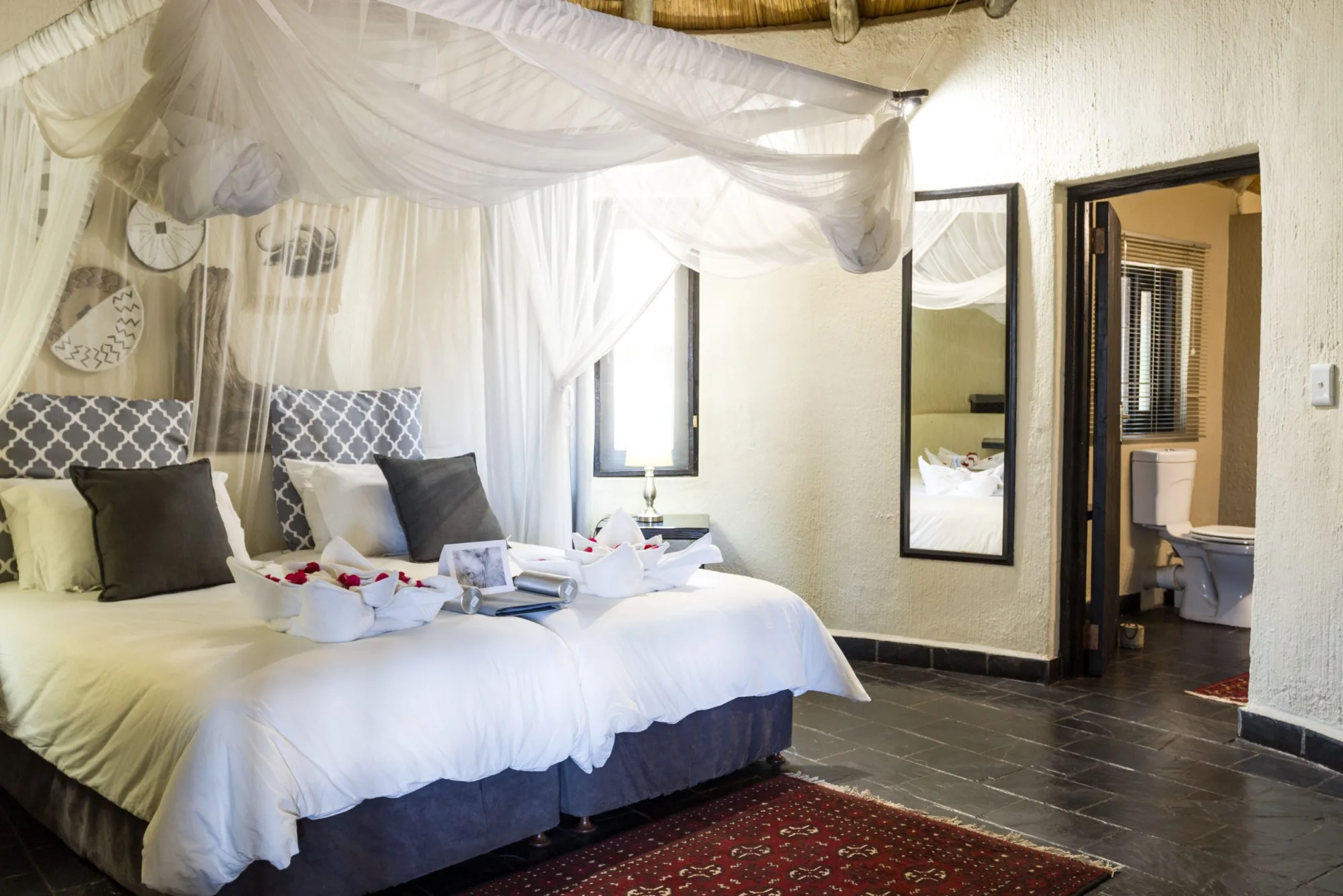 Mosquito-netted lodge bedroom