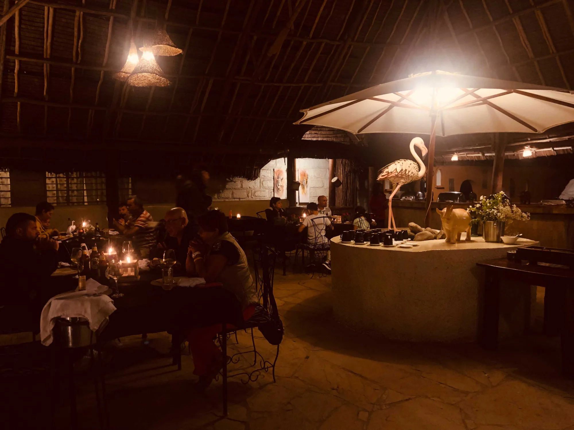 A flamingo-themed centerpiece in the camp's dining room, a nod to the property's namesake birds