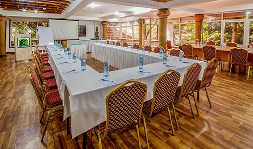 The tree-lined grounds of Forest Cottages in Bukoto, Kampala