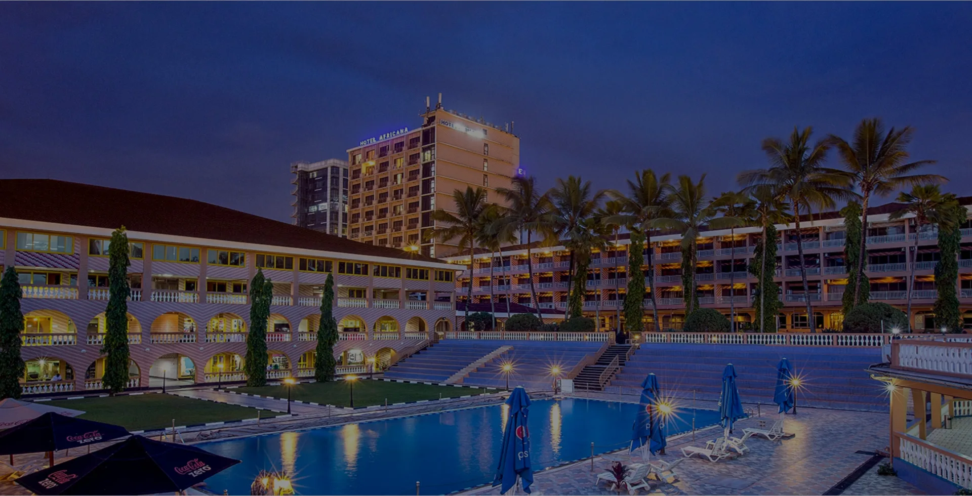 Pool and hotel exterior