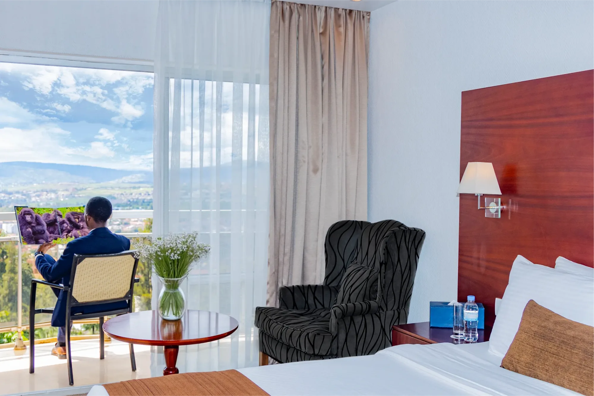 The sweeping view of Kigali's hills from a guest balcony.