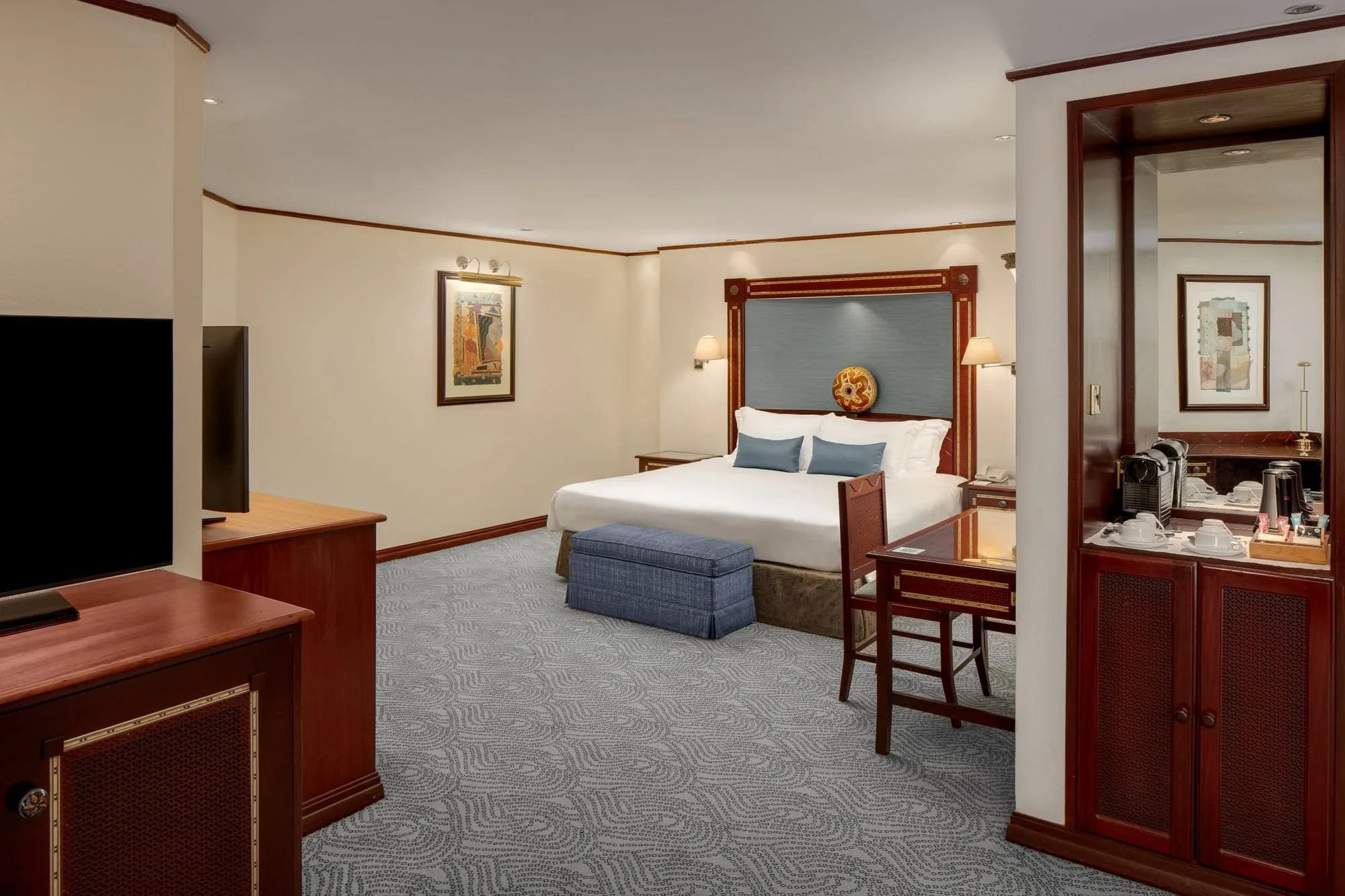 A spacious Junior Suite blending contemporary comfort with cultural charm