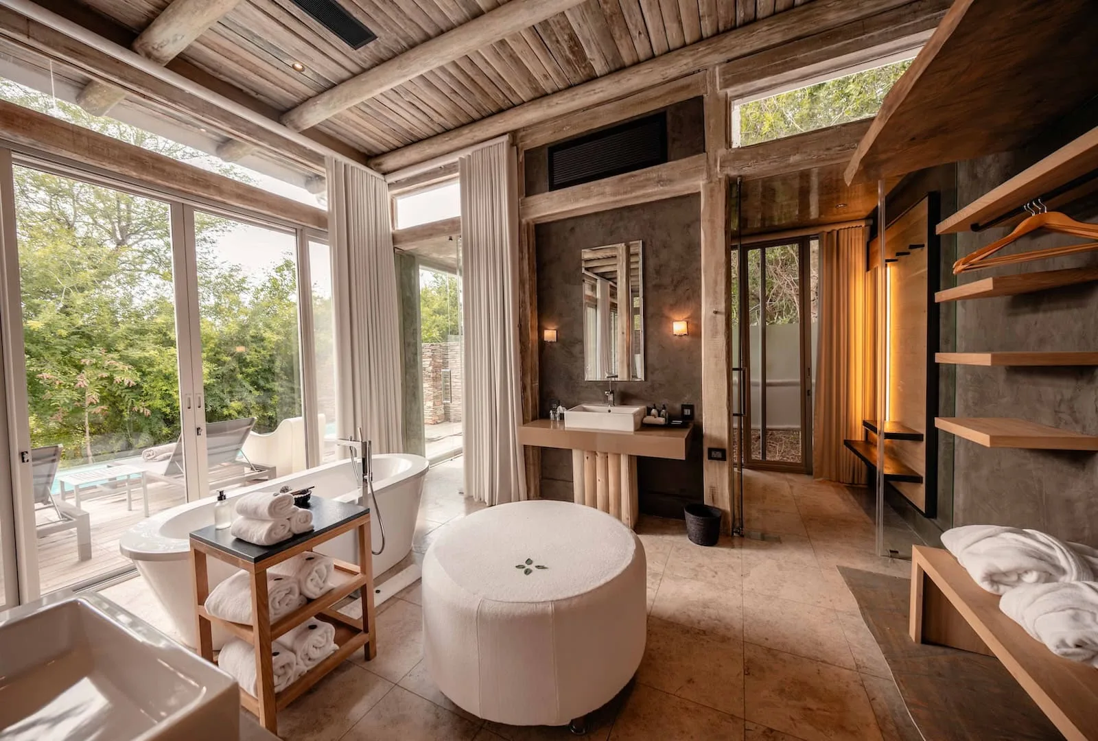 Glass-fronted en-suite bathroom