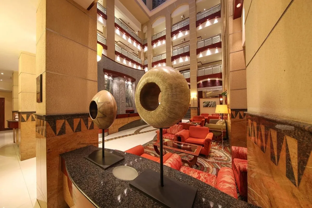 The hotel's soaring atrium lobby and lounge seating.
