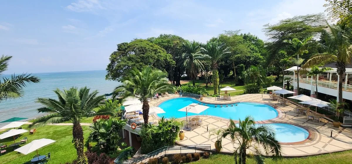 The pool terrace opens directly onto the shores of Lake Kivu.