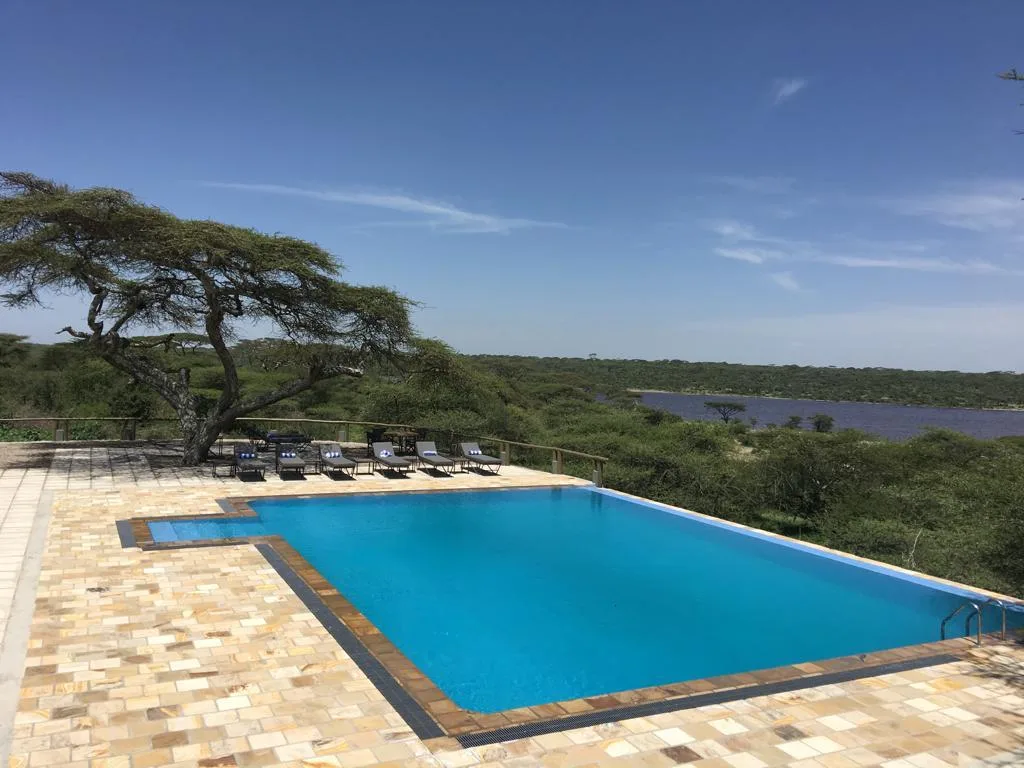 Swimming pool with a lake view