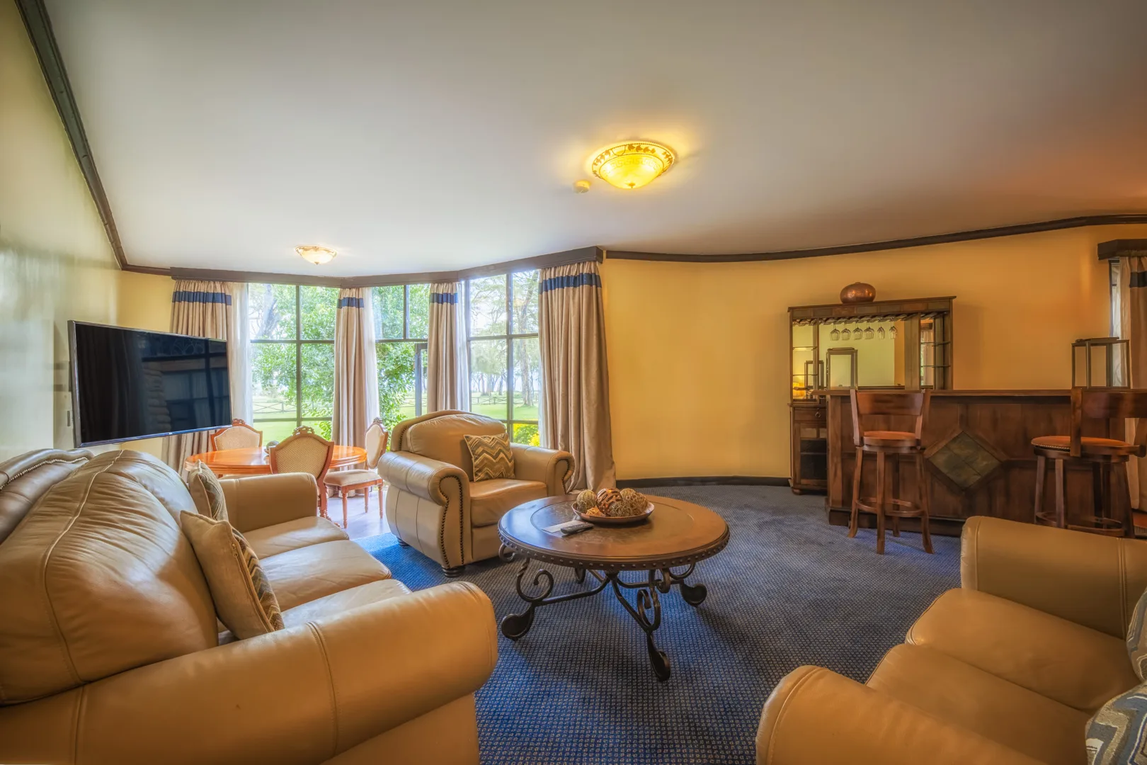 A family suite's private lounge and bar area