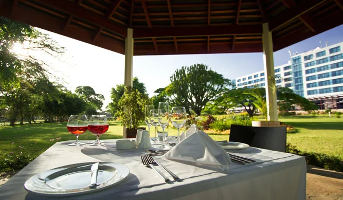 The Mawenzi bar overlooks the adjoining restaurant and serves a full spirits selection.