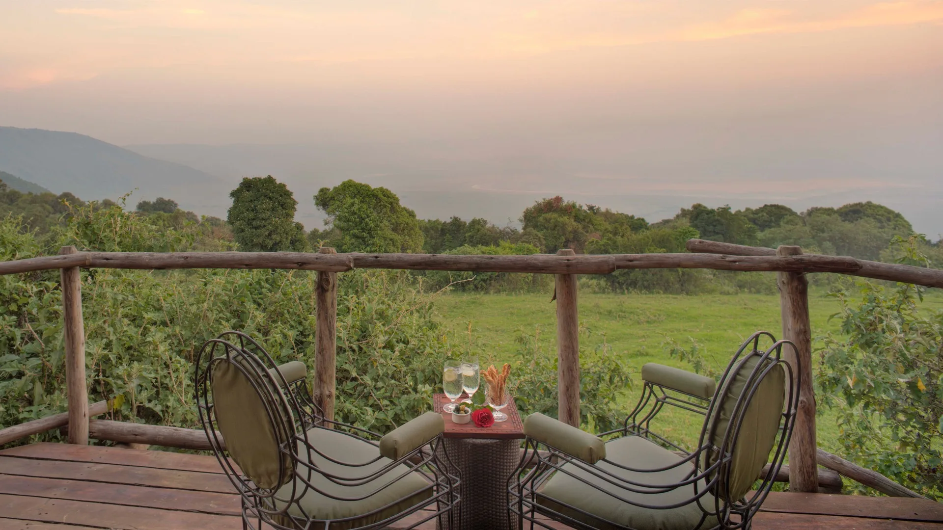 Private terraces open directly onto uninterrupted views of the crater floor below.