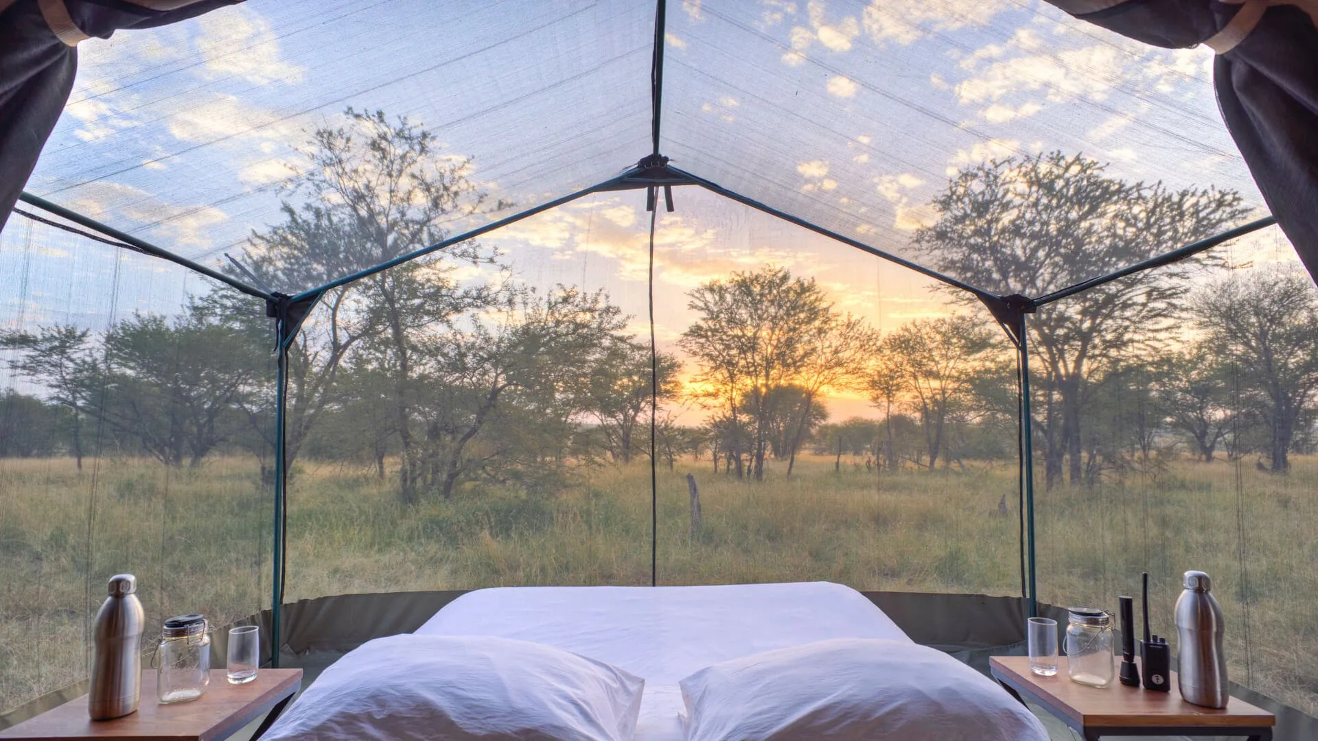 Mesh-enclosed star bed at sunrise