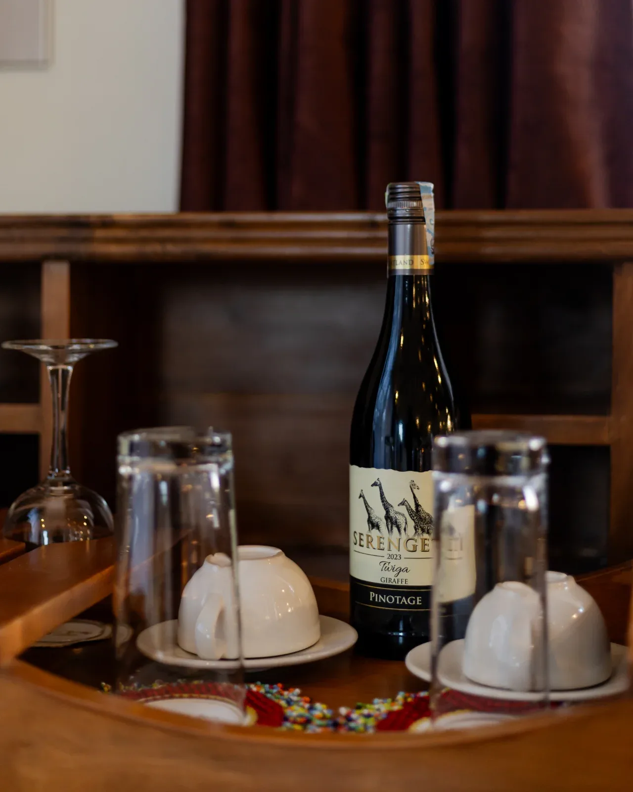 Evening refreshments served with Tanzanian wine at the camp bar.
