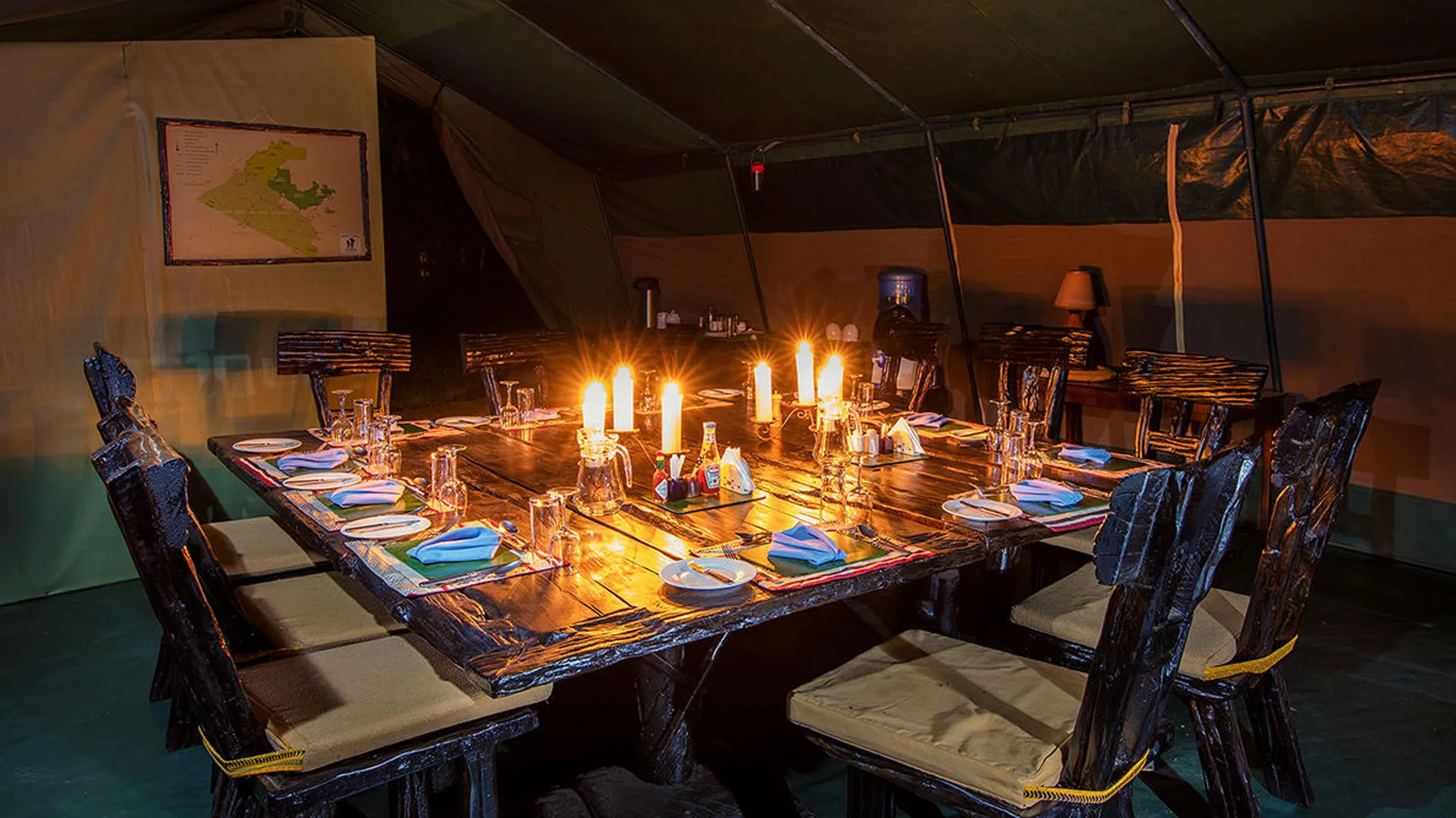 Dining tent set for dinner