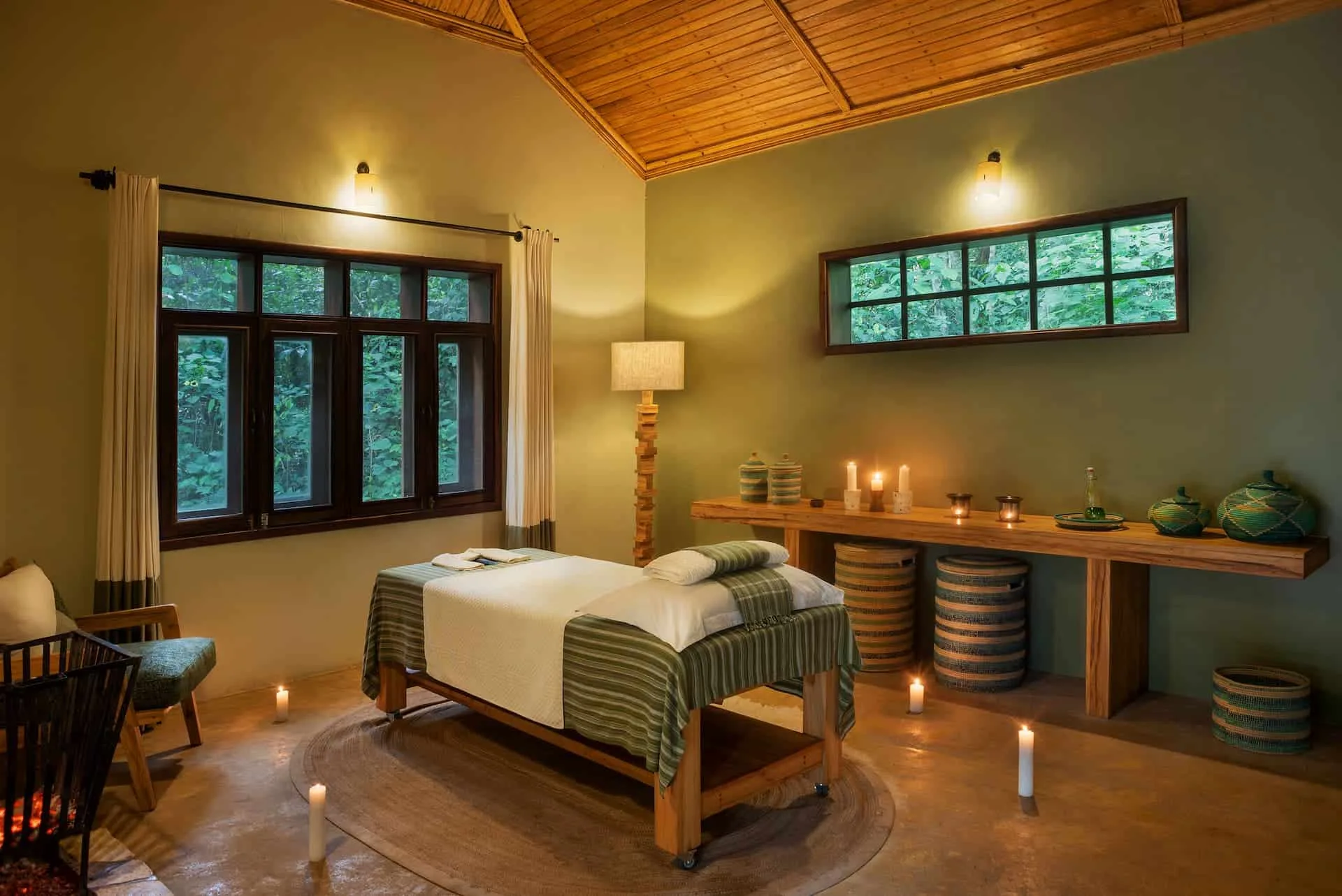 Luxury cottages feature four-poster beds and terracotta-tiled floors.