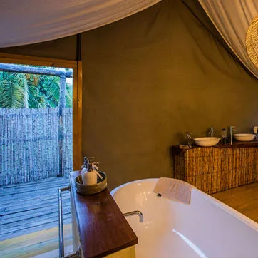 Private tree-top tent bathroom
