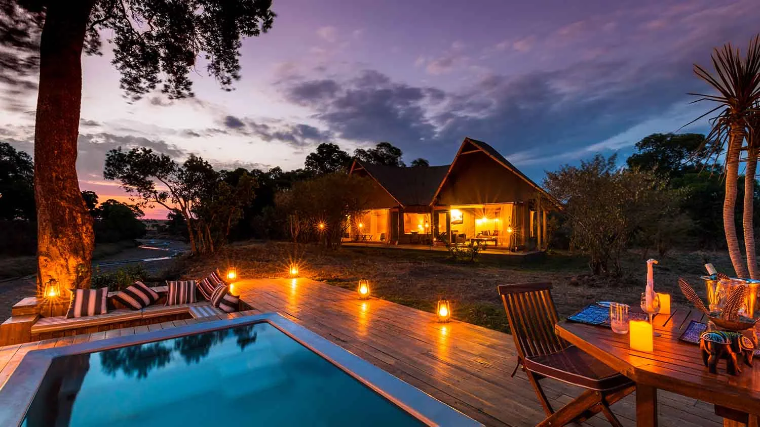 Tent and plunge pool after sunset