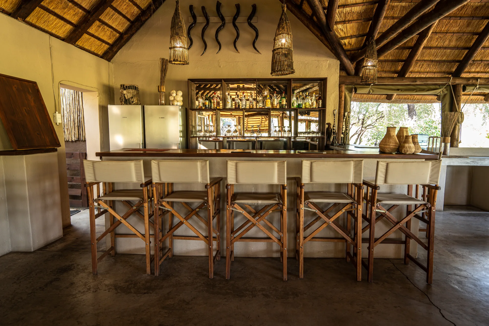 Open-sided thatched bar