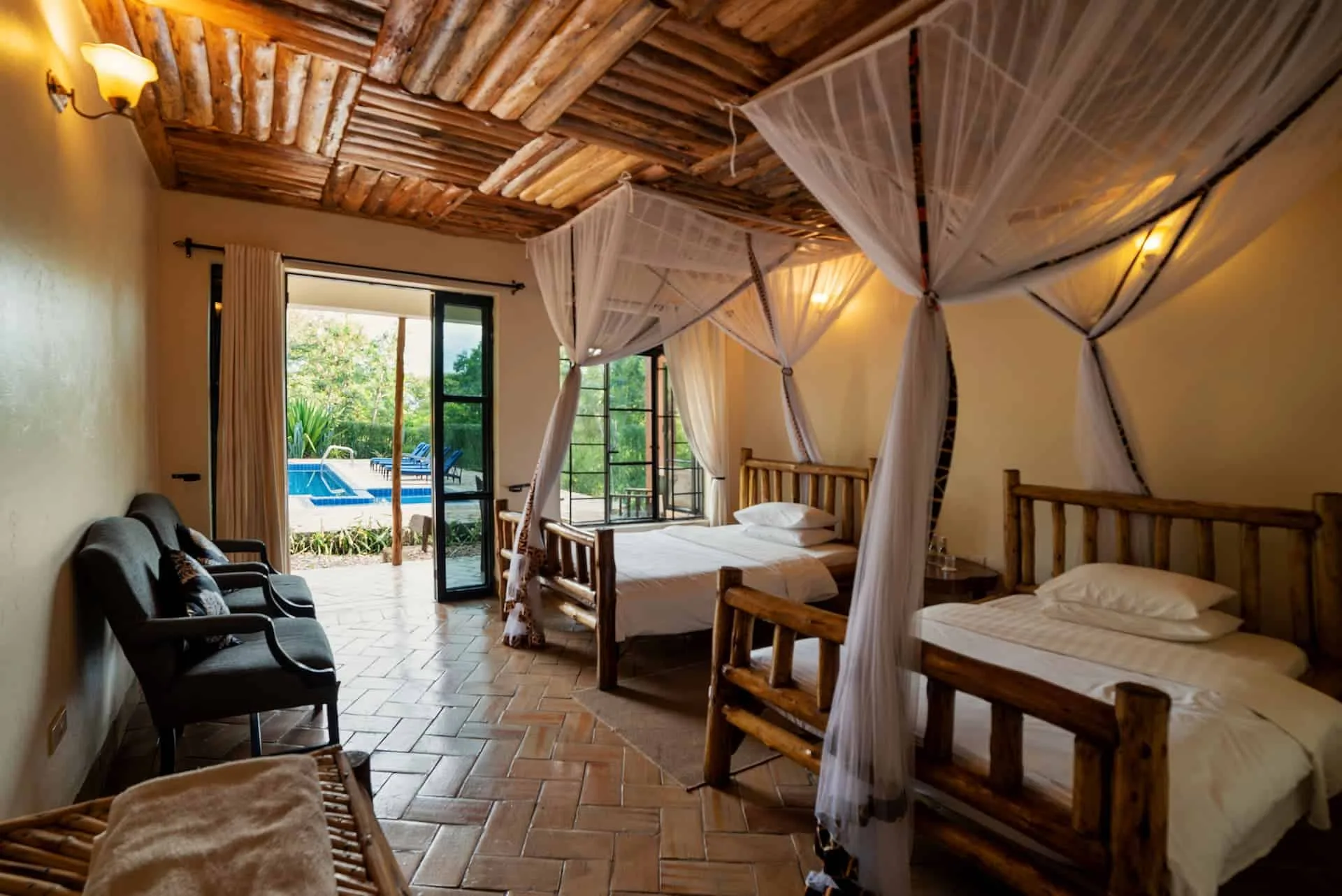 Inside a twin room, opening directly onto the pool deck