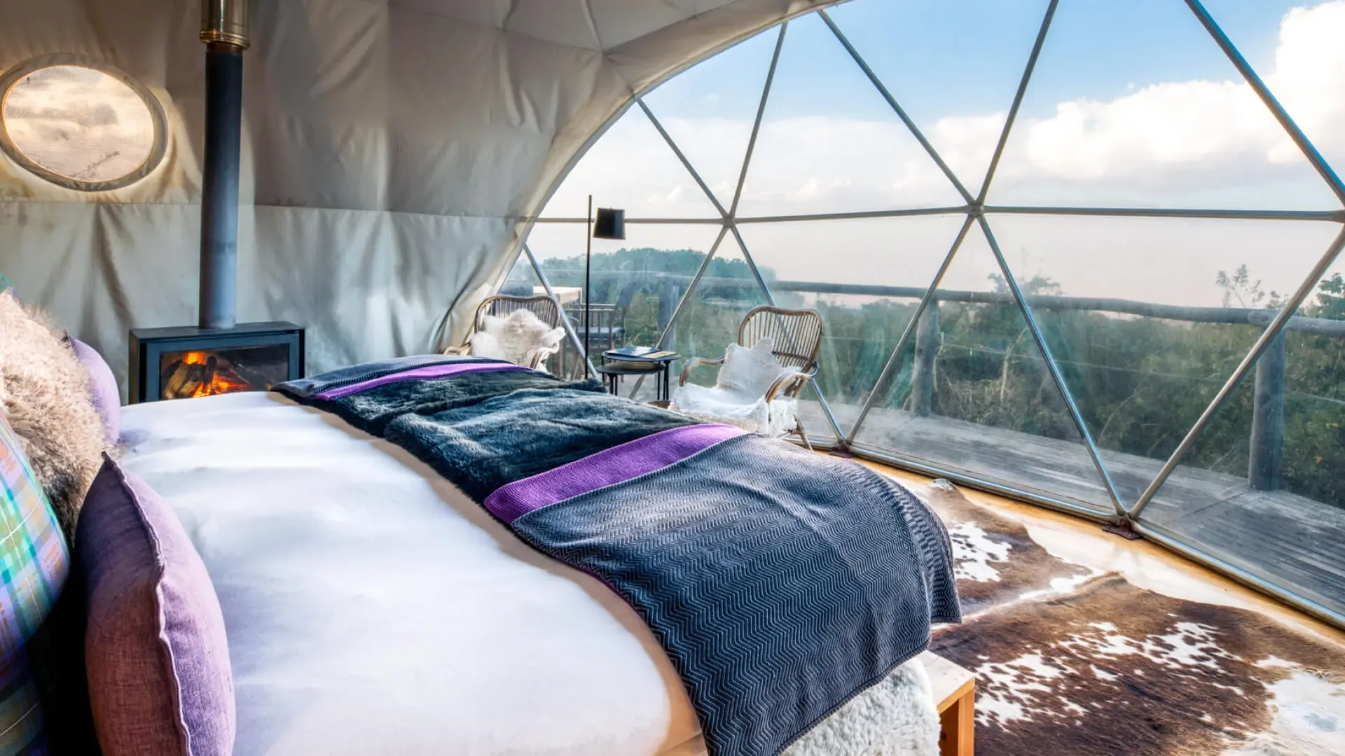 Domed suites blend into the forested highlands above the Ngorongoro Crater.