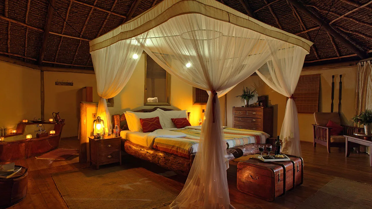 Spacious tented suites blend safari charm with plush, mosquito-netted comfort.