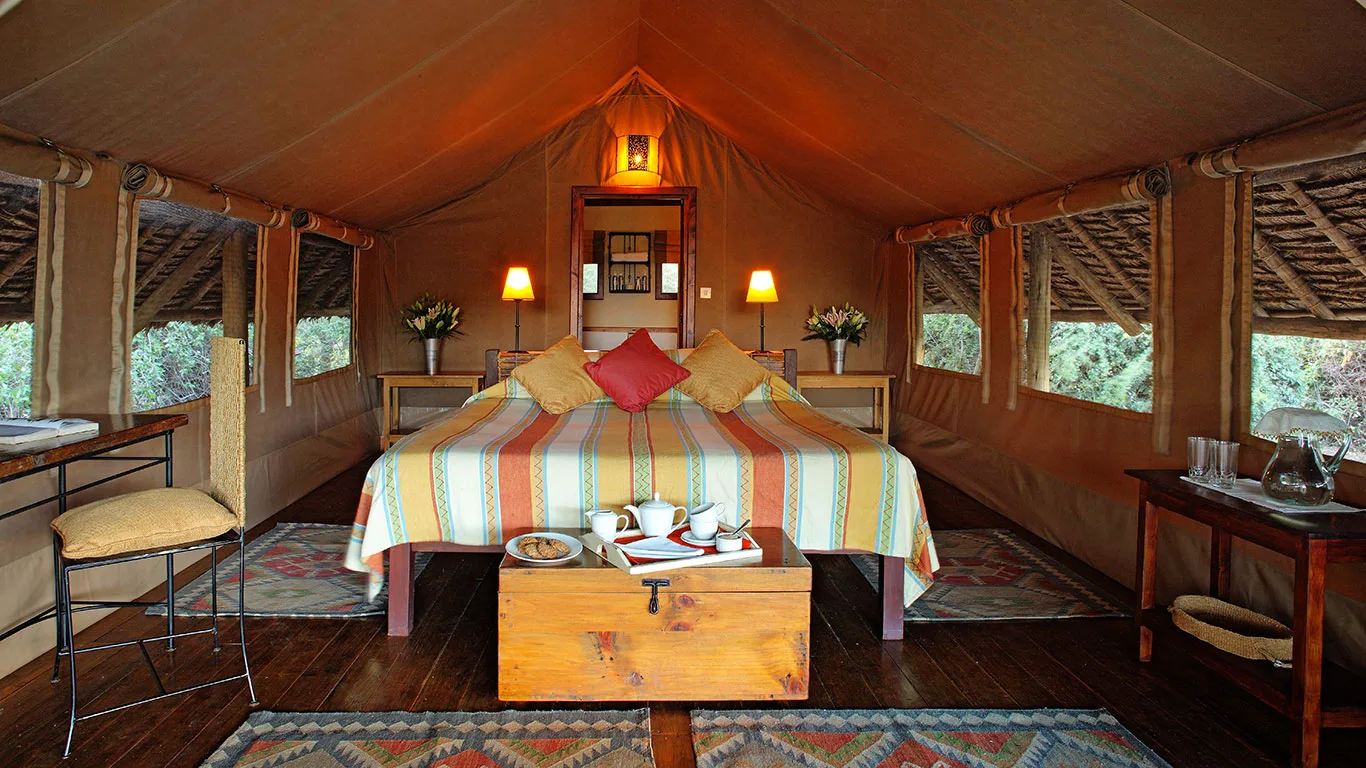 Canvas-and-thatch tents furnished with an eye for relaxed East African style.