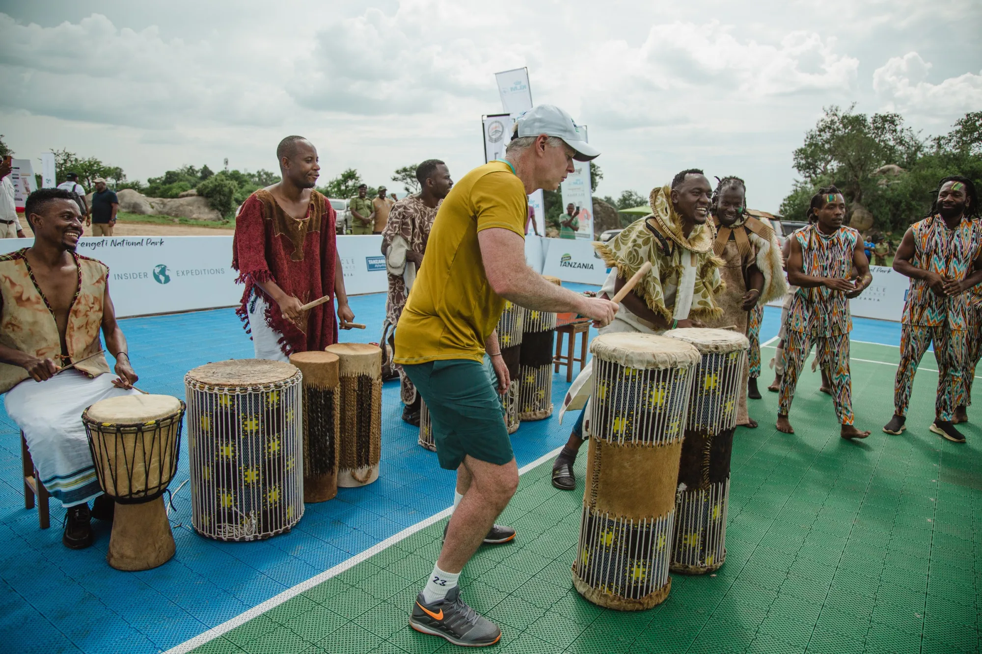 A guest joins the drummers