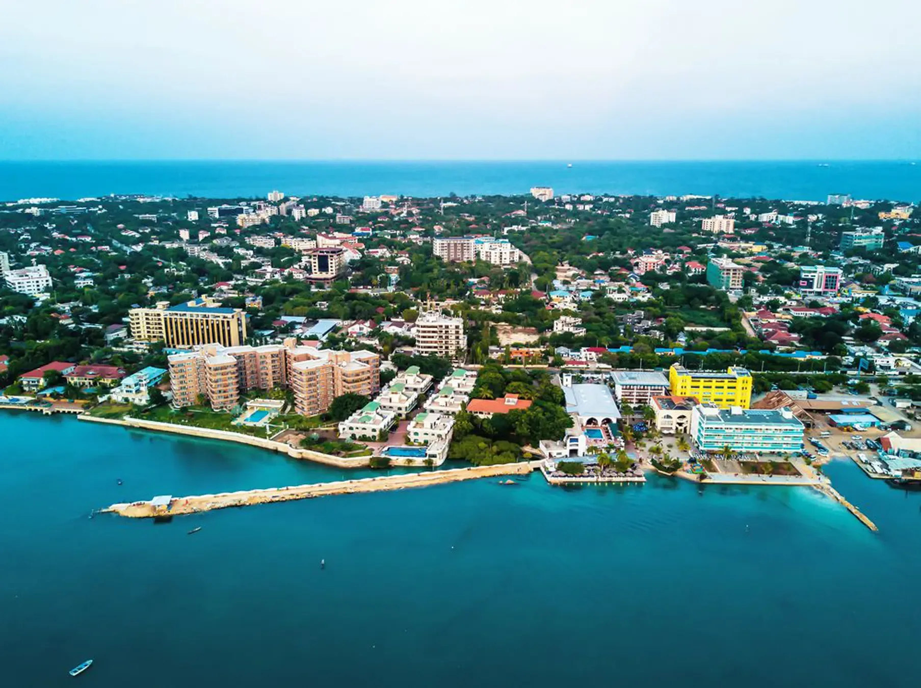 Aerial view over the waterfront and city skyline of Dar es Salaam, Tanzania.