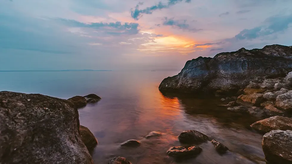 Dusk settles over the calm waters of Lake Kivu at Gisenyi, Rwanda.