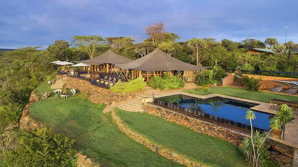Tented suites and a pool above the lawns at Loisaba, Laikipia, Kenya.