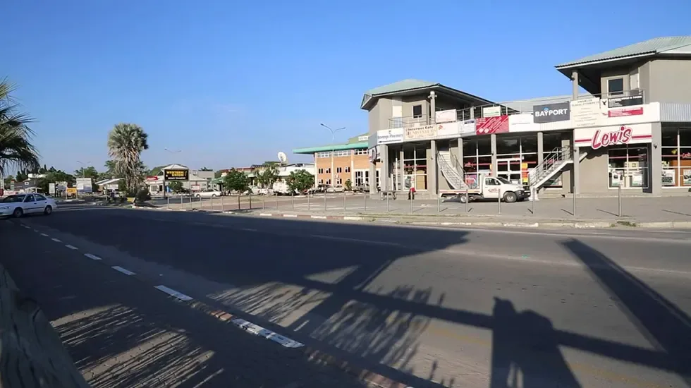 A quiet street scene in Maun, Botswana, on a clear morning.