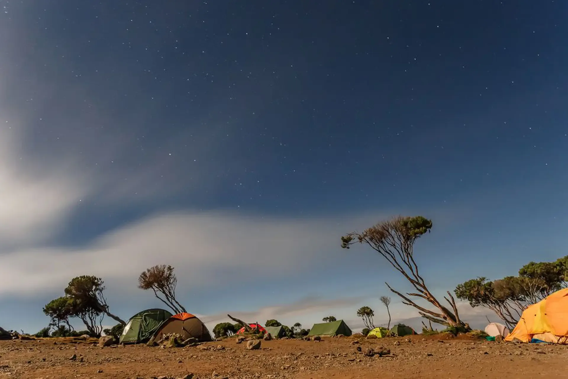 Tents pitched under a starry sky on the Machame Route, Mount Kilimanjaro, Tanzania.