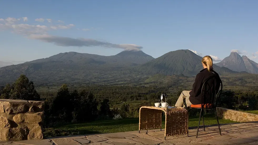 Morning coffee on a terrace facing the Virunga volcanoes in Rwanda.