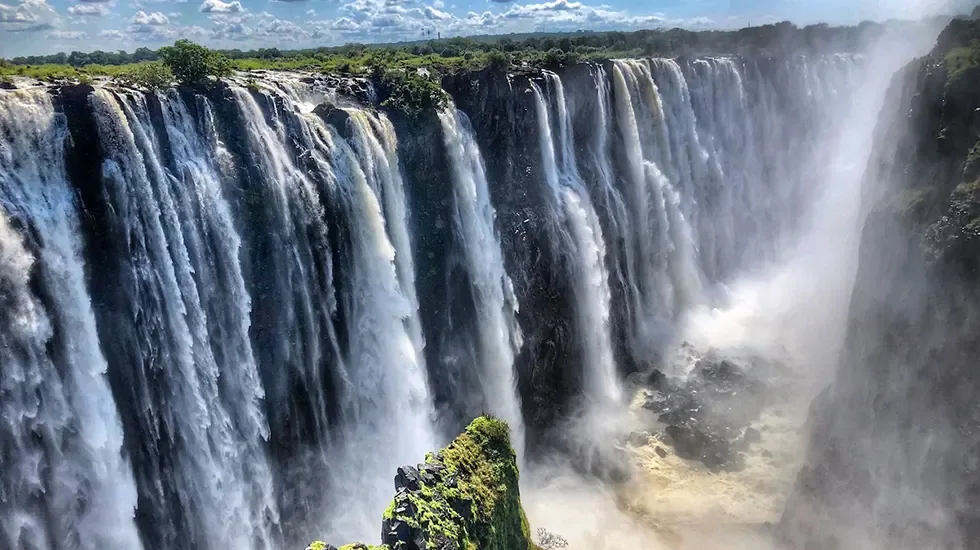Sheer curtains of water tumble into the gorge at Victoria Falls.