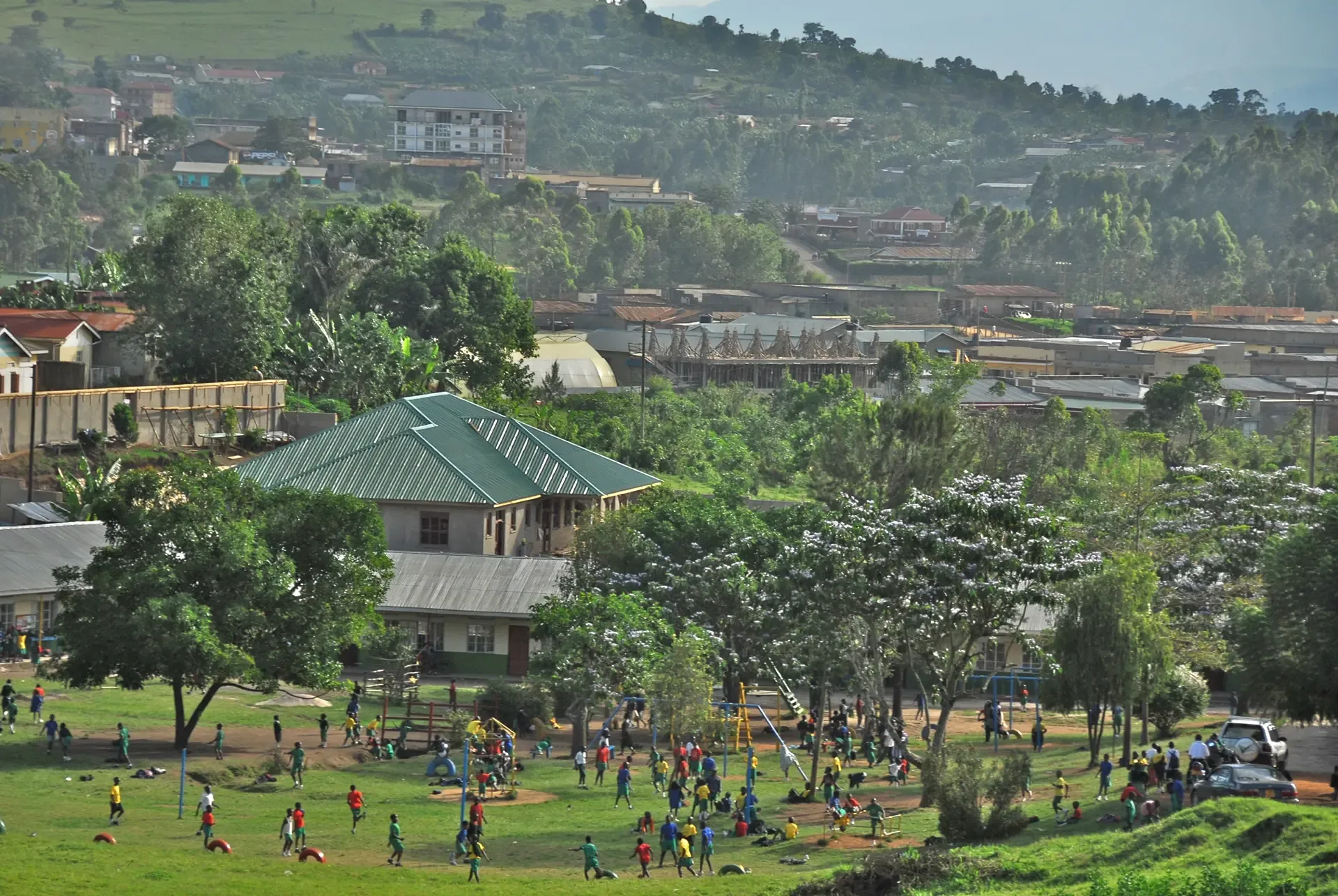 Children at play on the green in Fort Portal, Uganda