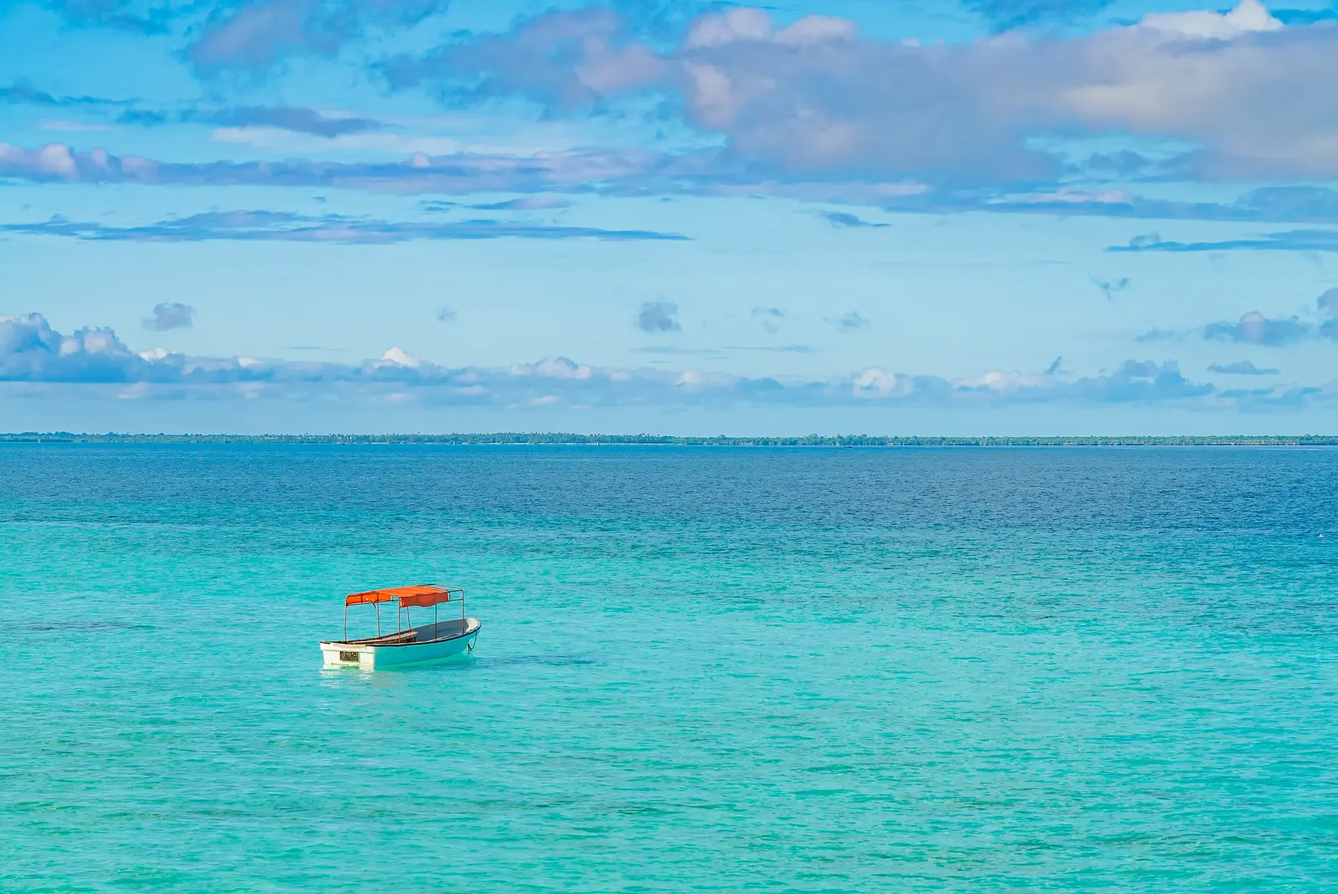 One fishing boat water indian ocean Zanzibar Tanzania